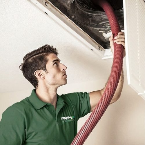 Prime Air Duct Solutions Technician Doing the service